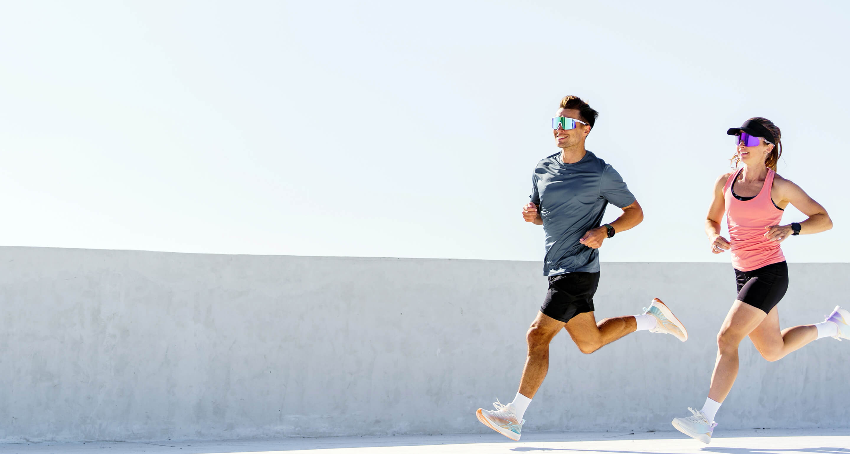 Two runners training outdoors